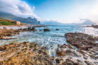Outstanding seascape of Isolidda Beach near San Vito cape. Popular travel destination of Monte Cofano National Park. Location: San Vito Lo Capo, Province of Trapani, Sicily, Italy, Europe