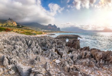 Outstanding seascape of Isolidda Beach near San Vito cape. Popular travel destination of Monte Cofano National Park. Location: San Vito Lo Capo, Province of Trapani, Sicily, Italy, Europe