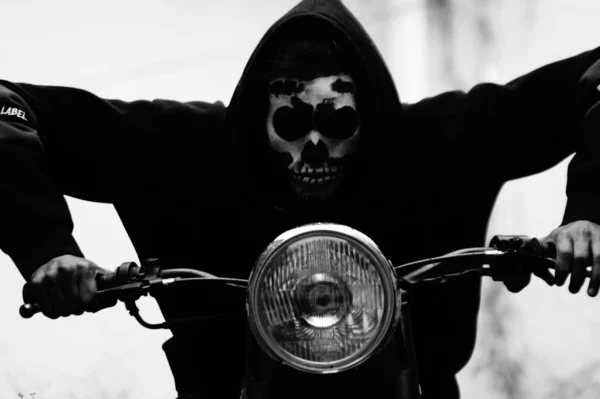skull makeup male with motorcycle black and white