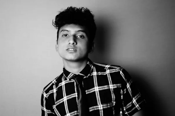 young boy front look black & white image, b&w