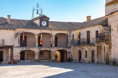 Old Town Hall of the medieval town of Pedraza with its balconies with stone arches, Segovia, Spain