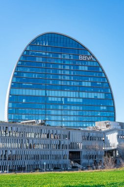Madrid, Spain, February 4, 2023: Skyscraper building and other BBVA bank office buildings in Madrid