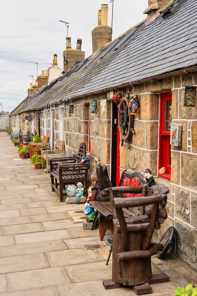 Fishing district with typical houses of ancient times in the city of Aberdeen, Footdee, Scotland