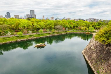 Office buildings and company headquarters next to Osaka Castle Park, Japan clipart