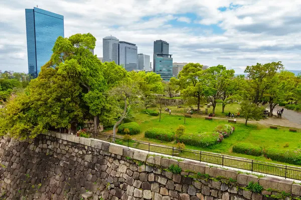 stock image Office buildings and company headquarters next to Osaka Castle Park, Japan