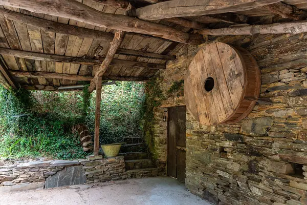 stock image Old village house made of stone and wood in deep Asturias, Taramundi