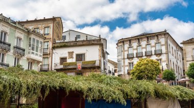 Old buildings in the main square of Mondonedo with old market for pilgrims, Galicia clipart