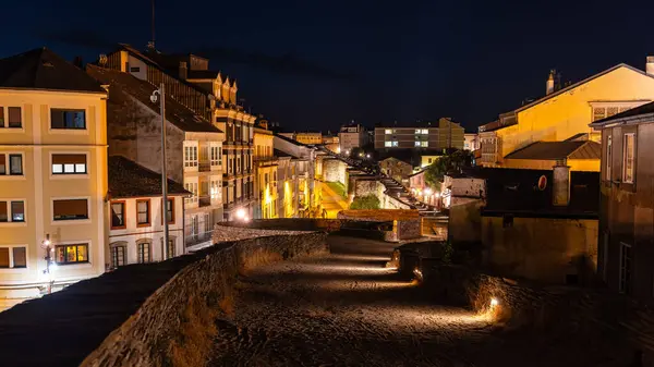 stock image Roman wall of the city of Lugo at night, a world heritage site