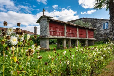 Stone and wood warehouse called Horreo used in the past to store the harvest, Galicia clipart