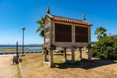 Old constructions in Galicia to store the grain of the harvest, called Horreos clipart