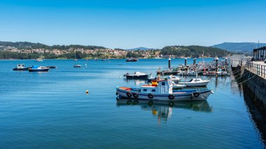 Fishing port in the town of Combarro in the Galician estuary of Pontevedra clipart