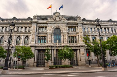 Facade of the Bank of Spain on Calle Alcala in the city of Madrid, Spain clipart