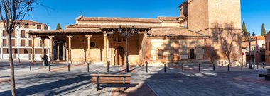 Facade of the co-cathedral of Santa Maria in Mudejar style in the city of Guadalajara, Castilla la Mancha clipart