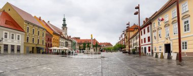Glavni Square, open space with picturesque buildings around in the center of Maribor, Slovenia.