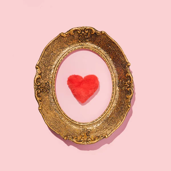 Fur heart in vintage oval picture frame, creative retro aesthetic, love and passion idea. Valentine's day romantic celebration.