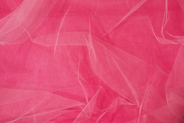 Pastel pembe tül kumaş, pembe kağıt kaplama arka plan, yaratıcı desenli düzen..