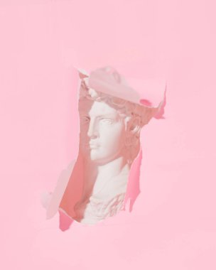 Gazete. Deliğin içinden güzel bir adamın alçı figürünü görebilirsiniz. İtalyan Rönesansı tarzında..