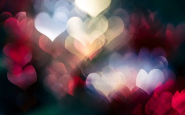 Parlayan ve parıldayan kalpleri olan sevgililer günü arkaplanı 