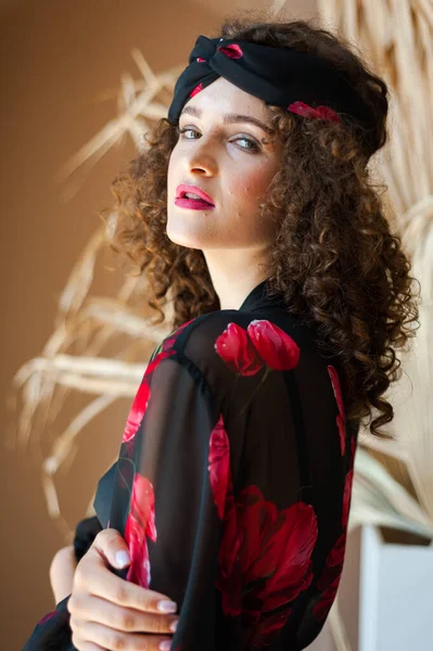 stock image portrait of a beautiful young woman in a red dress