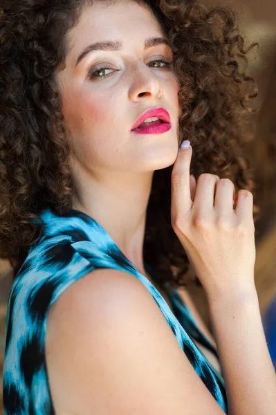 stock image portrait of a beautiful young woman with long curly hair