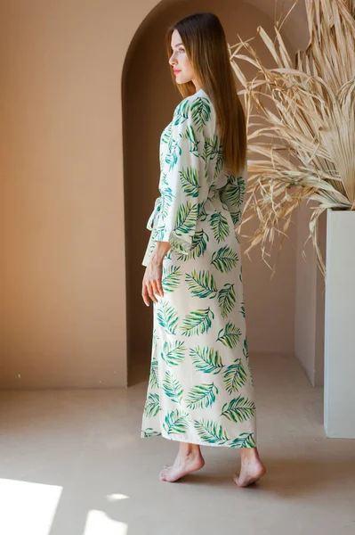 stock image beautiful young woman in a dress