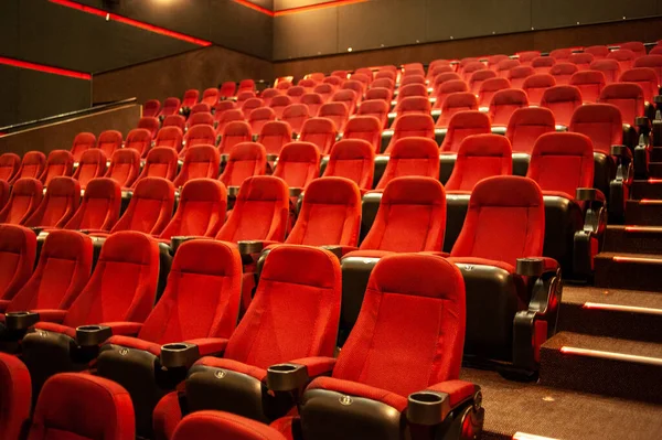 stock image empty cinema hall with red seats and chairs