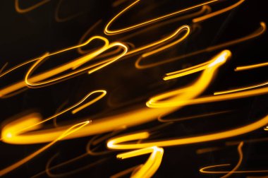 Işık parçacık izleri. Neon parıltısı. Arka plan bulanık. Soyut doku. Modern sanat. sanatsal dijital sanat eserleri.