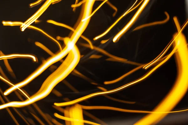 Lätta Partikelspår Neonglöd Suddig Bakgrund Glödande Linjer Svart Abstrakt Jul — Stockfoto