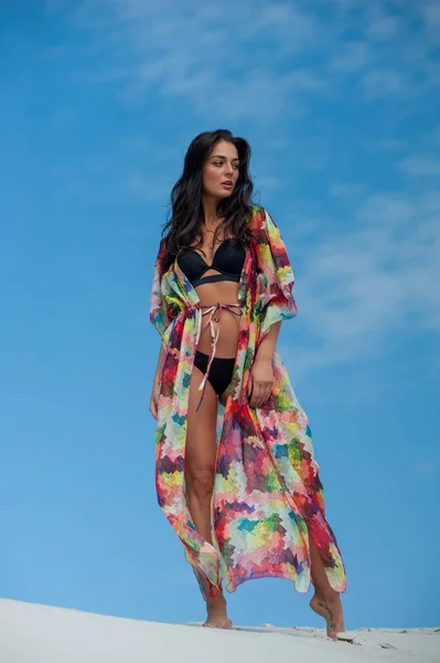 stock image beautiful young woman in swimwear posing on the beach