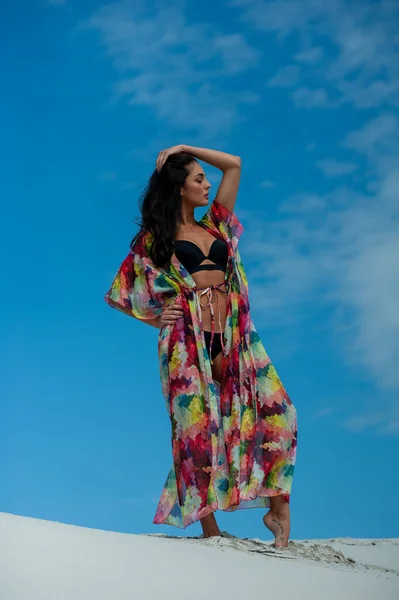 stock image beautiful young woman in a swimsuit on the beach