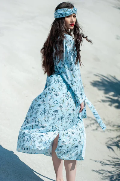 Stock image beautiful girl in a dress with a veil on the beach