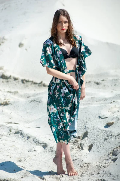 stock image beautiful girl in a swimsuit and a dress on the beach