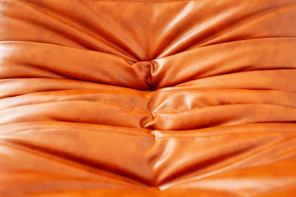 stock image brown color leather sofa texture.