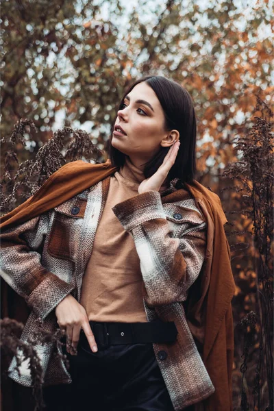 stock image beautiful young woman posing in a city park 