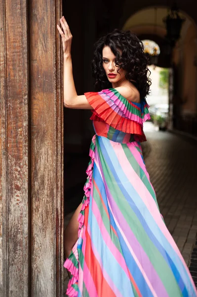 stock image beautiful woman in colorful dress 