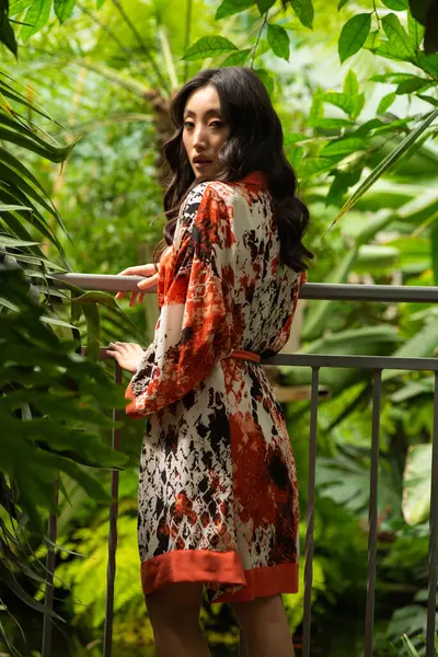 beautiful young woman in a tropical jungle