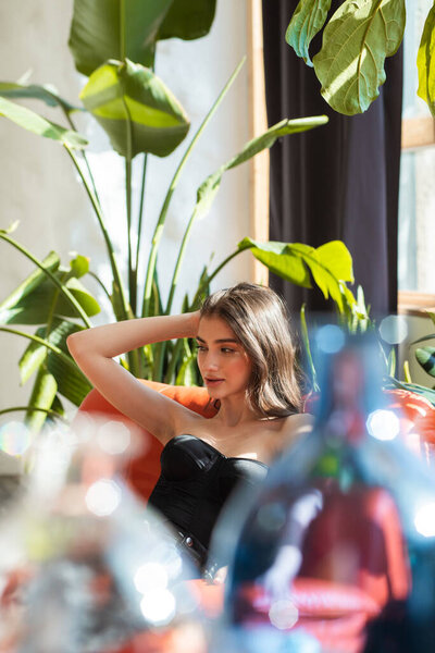 young beautiful woman posing in studio