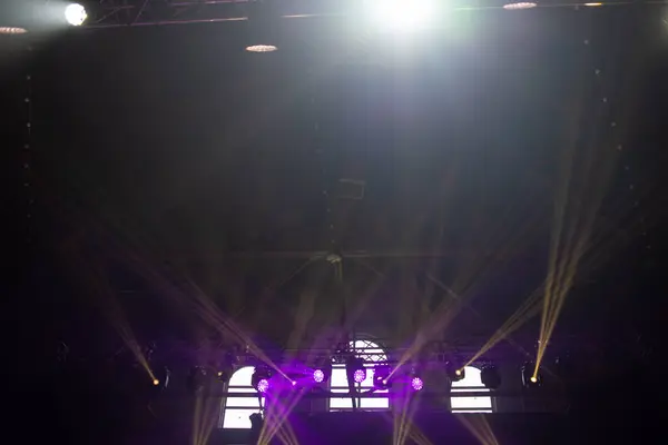 concert hall. stage lights.