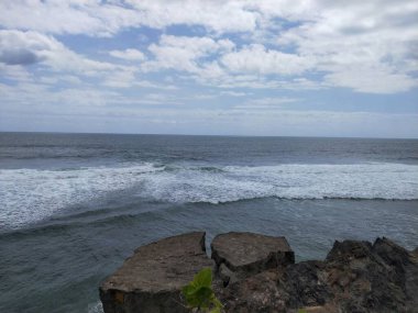 Beautiful wave of the sea on the sand beach.