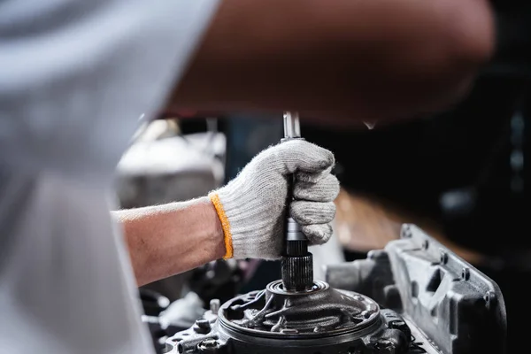 Stock image At the auto repair shop, the mechanics work on repairing and maintaining automobile engines to address any issues that may arise.