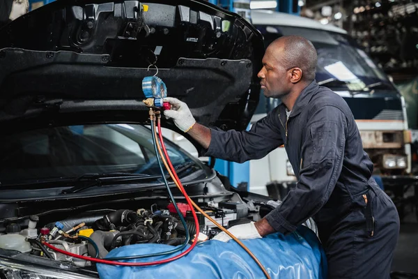 Garage Mechanics Examine Inspect Refrigerant Filling Car Air Conditioner Stock Image