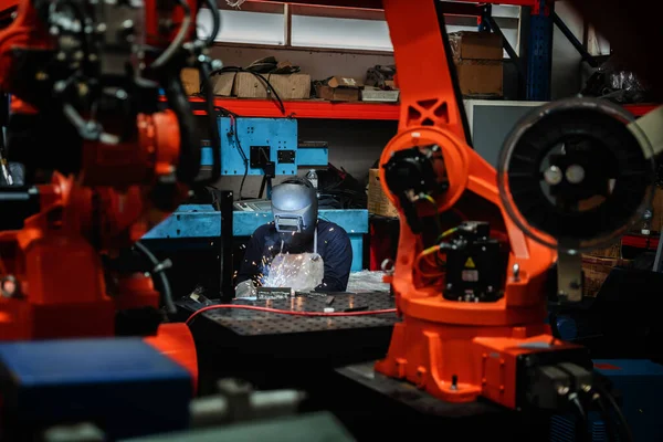 Industrial engineers are in charge of controlling the automated arms machine welding robots in companies that manufacture industrial goods.