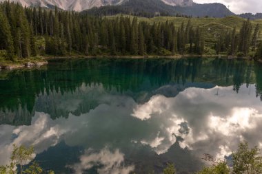 Lake Carezza is a small alpine lake in the Dolomites, italy.