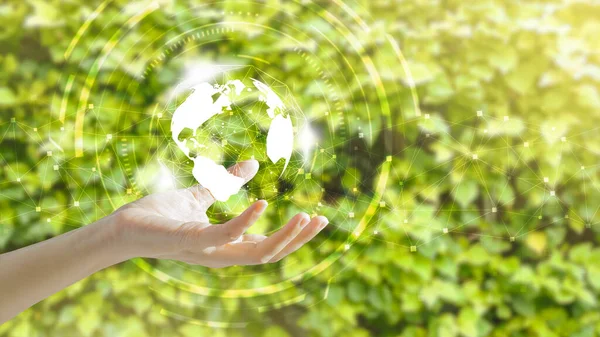 Earth on hand.Low polygon.Agriculture green technology and environment concept, ecology system.Hi-tech and futuristic.Digital and technology concept background.