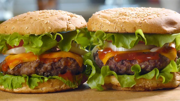 Big Appetizing Burgers Fresh Tomatoes Onions Juicy Grilled Beef Patty — Zdjęcie stockowe