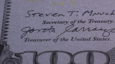 100 US dollar banknote Extreme macro. Fragment of one hundred dollar bill close-up. Cash money background. Detail view of USD currency cash. Business, investment, fiat money, finance.