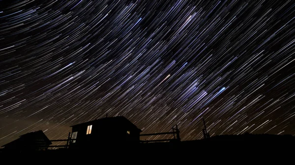 Wooden House Mountains Winter Star Trails Night Sky — Stock Photo, Image