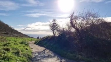 Sunny day in Porthcurno beach Cornwall, England February 2023.