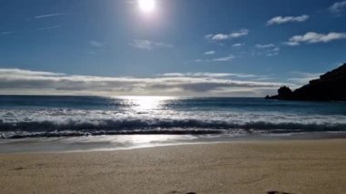Sunny day in Porthcurno beach Cornwall, England February 2023.