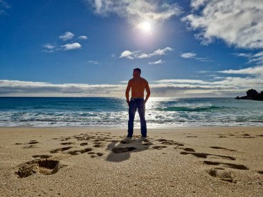 Sunny day in Porthcurno beach Cornwall, England February 2023.